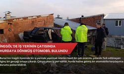 İnegöl’de iş yerinin çatısında hurdaya dönmüş otomobil bulundu